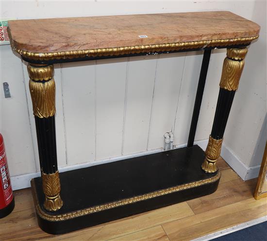 An ebonised marble top parcel gilt console table W.104cm